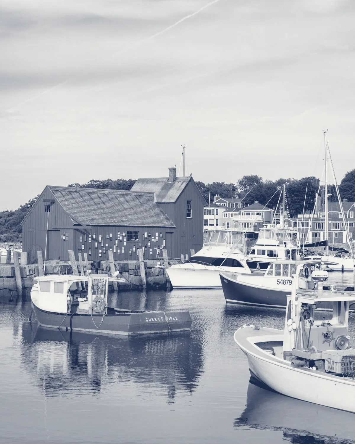 A coastal New England harbor town.
